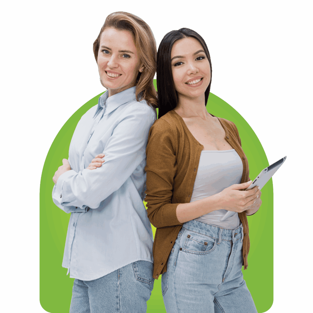 Two smiling women professionals with tablet standing together